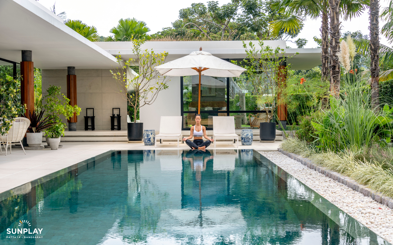 Active Woman Meditation at her Pool Villa